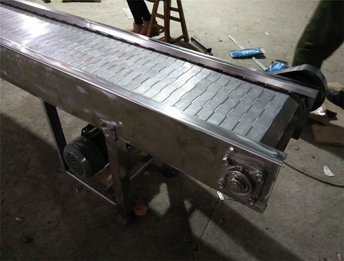 不銹鋼板式輸送機 沖孔清洗線助力金屬材料高效上料